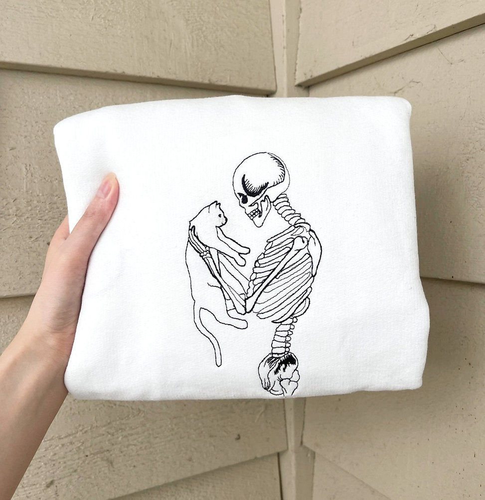 Skeleton Holding Cat and Dog Sweatshirt